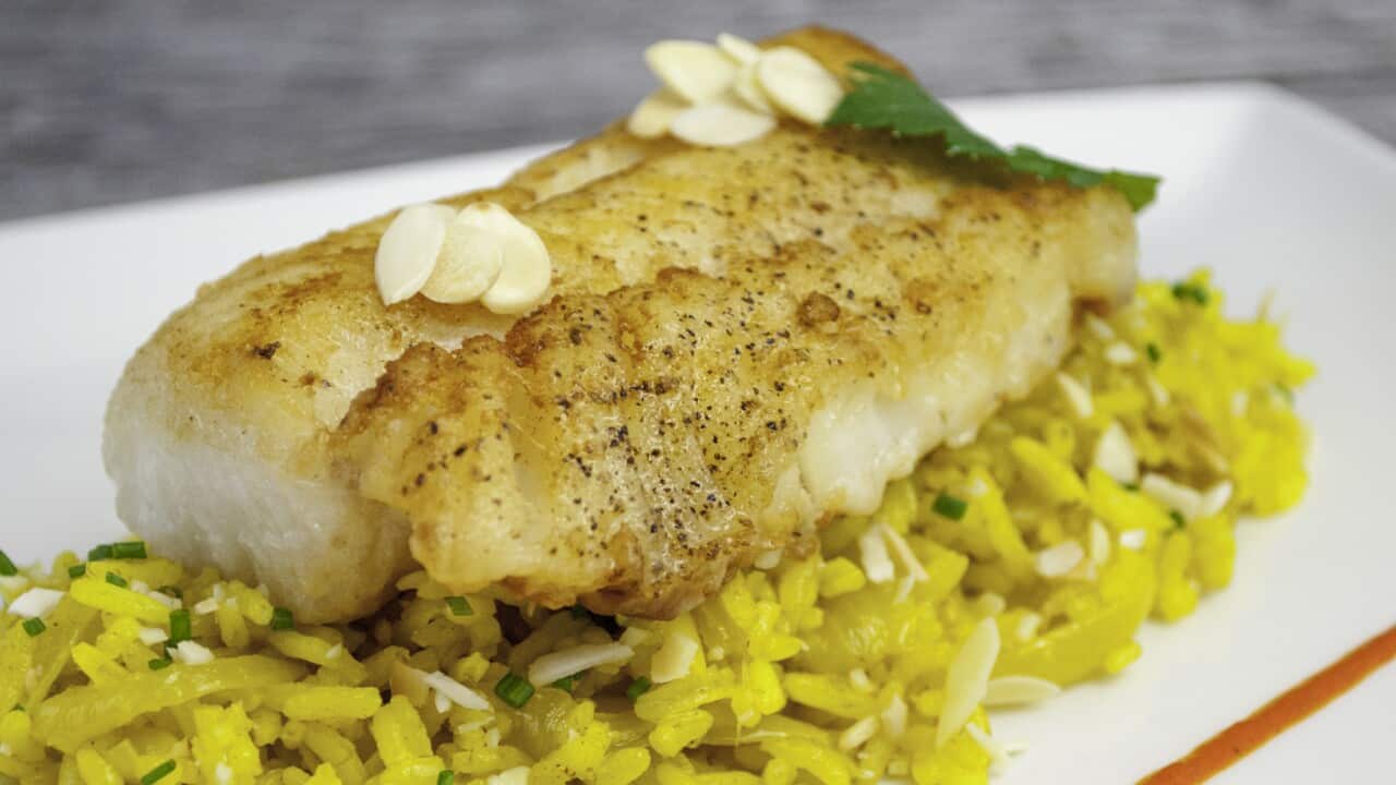 Fried cod with turmeric rice