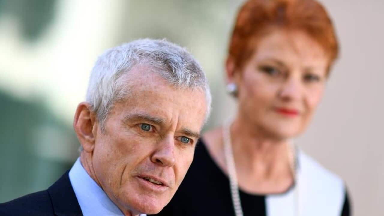 He's back... Malcolm Roberts with party leader Pauline Hanson.