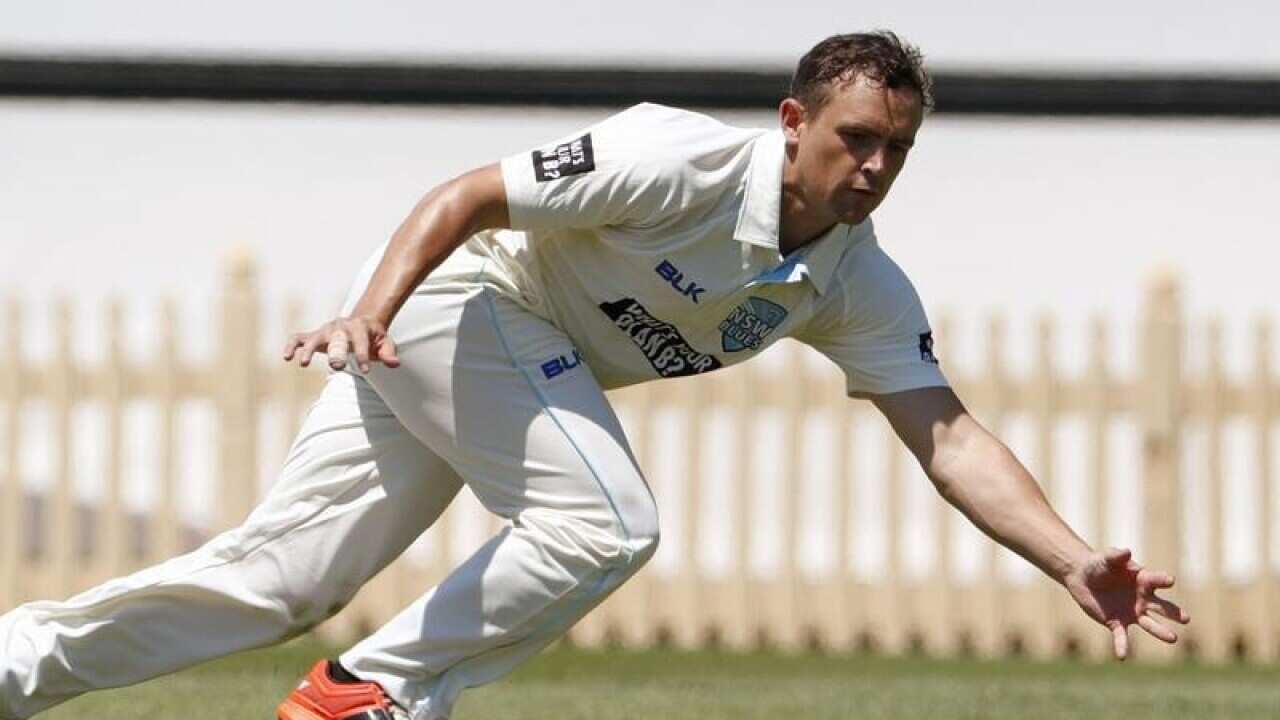 A file image of Steve O'Keefe catching a ball during a match.