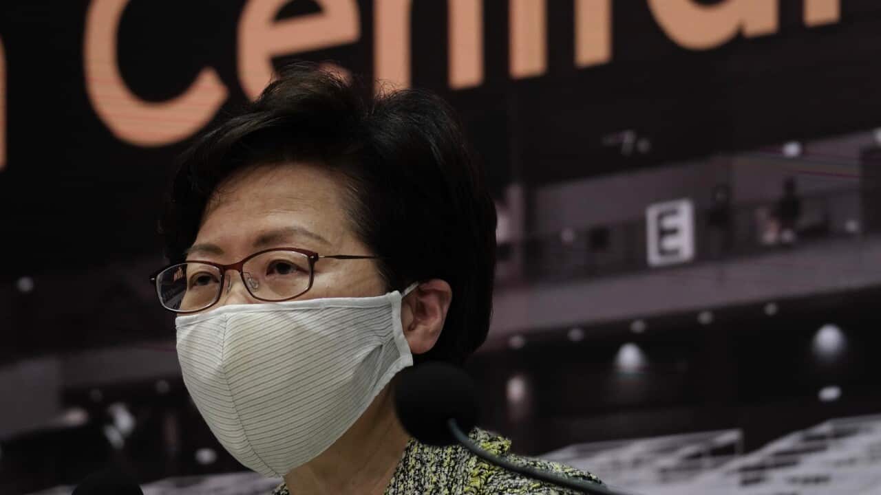 Hong Kong Chief Executive Carrie Lam listens to reporters' questions during a press conference in Hong Kong, Friday, Aug. 7, 2020.