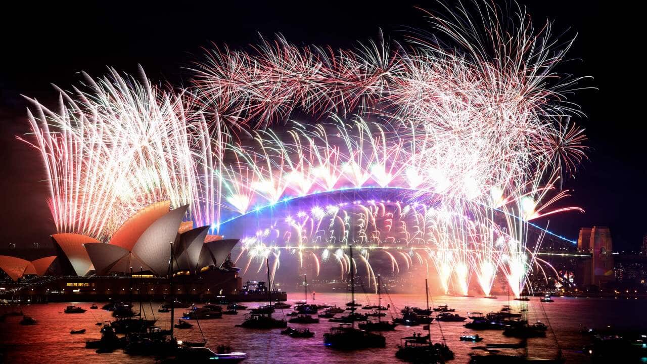 New Year's Eve fireworks light up the sky over Sydney's iconic Harbour Bridge and Opera Houseduring the fireworks show on 1 January, 2022.