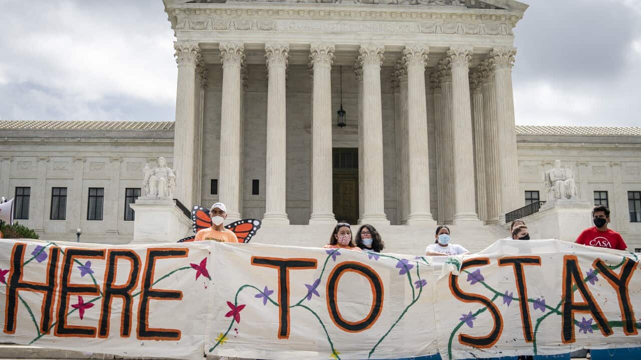 DACA recipients and their supporters rally outside the US Supreme Court.