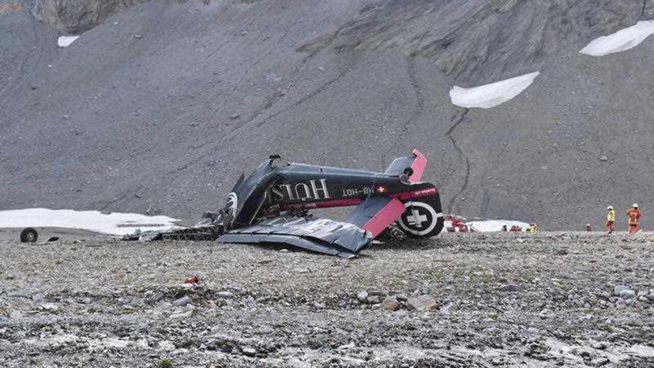 The photo provided by Police Graubuenden shows the wreckage of the old-time propeller plane Ju 52 after it went down went down Saturday Aug, 4 2018 on the Piz Segnas mountain above the Swiss Alpine resort of Flims, striking the mountain's western flank.