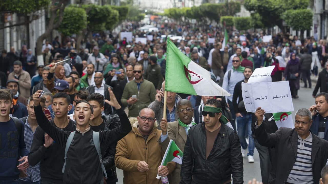 Algerian protesters gather against interim president in Algiers, Algeria.