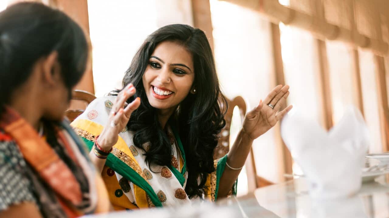 Young Indian Women Dining Together