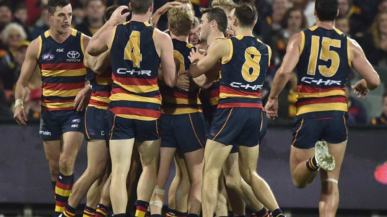Crows players celebrate