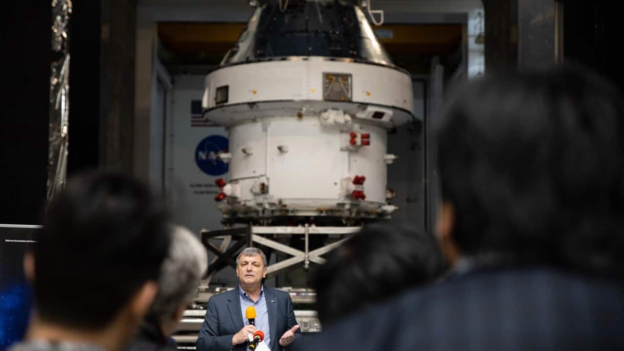 Spectators are seen at the unveiling of the Orion Space Craft