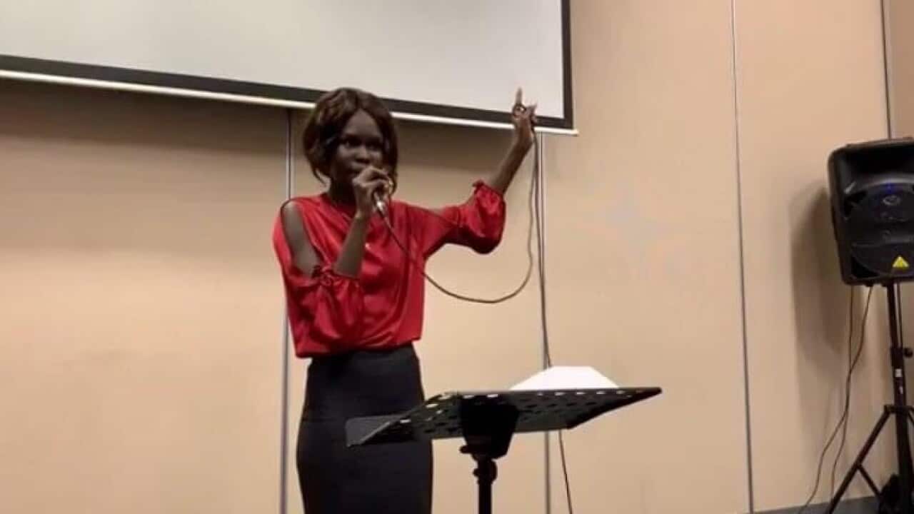 Diyo Ayuen preaching in one of the church service