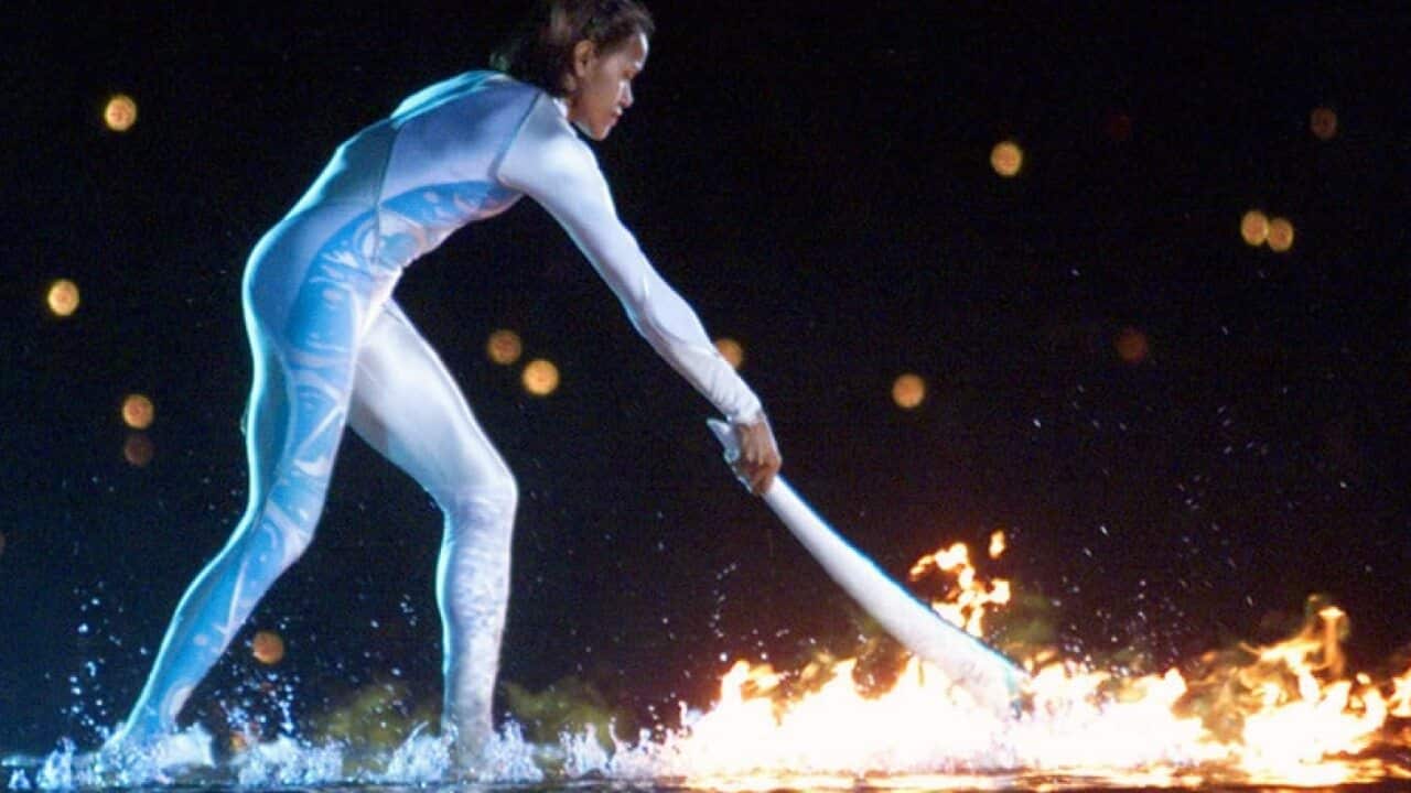 Cathy Freeman ignites the Olympic flame at Olympic Stadium