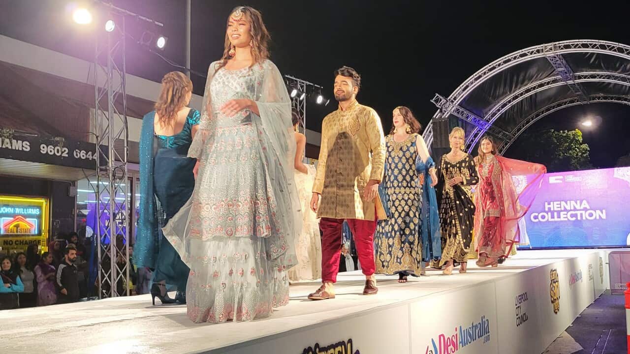 Models walk on the ramp showcasing designer wear from local businesses at the Starry Sari Night.