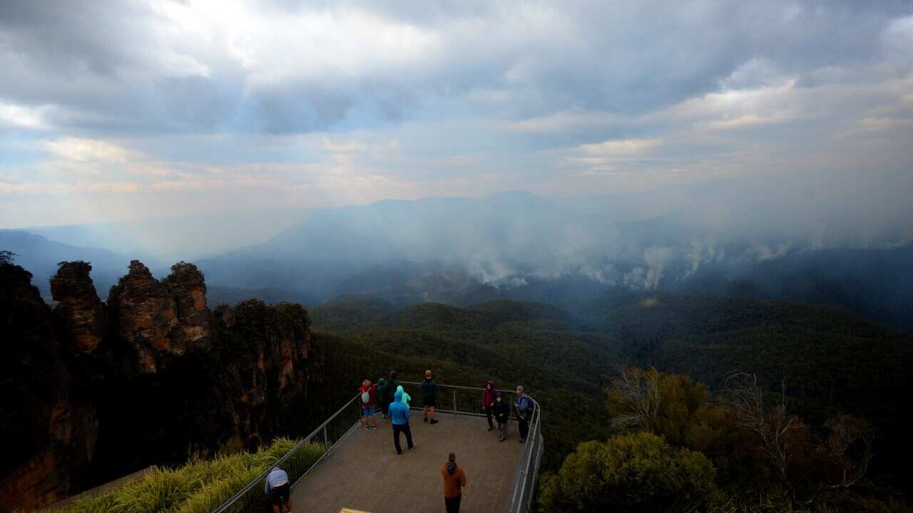 Smoke is seen as a fire continues to burn in Katoomba, Blue Mountains, Sydney, 2 December, 2019.