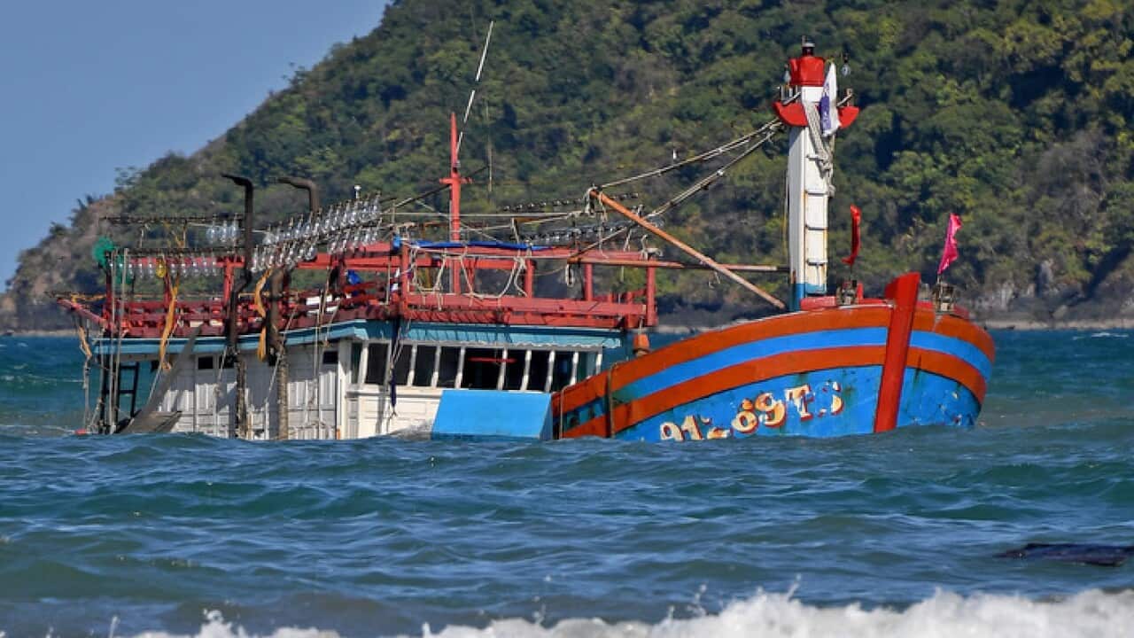 The sunken fishing boat at the mouth of the Daintree River