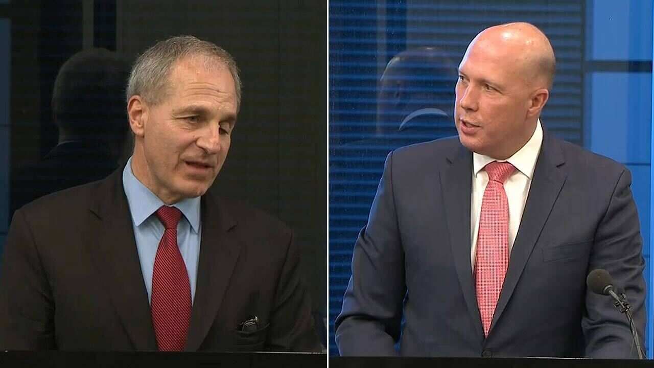 Former FBI Director Louis J. Freeh and the Home Affairs Minister Peter Dutton at the Australian Chamber of Commerce and Industry dinner.