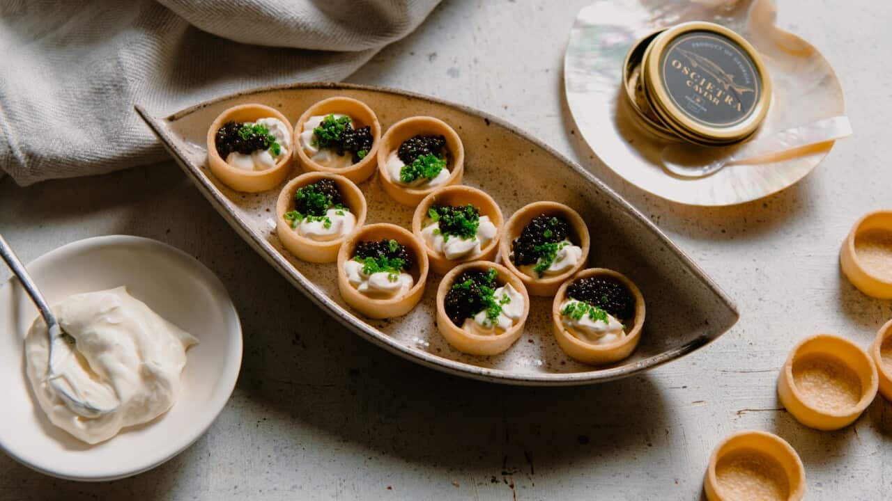 Caviar and yuzu crème fraîche tartlets