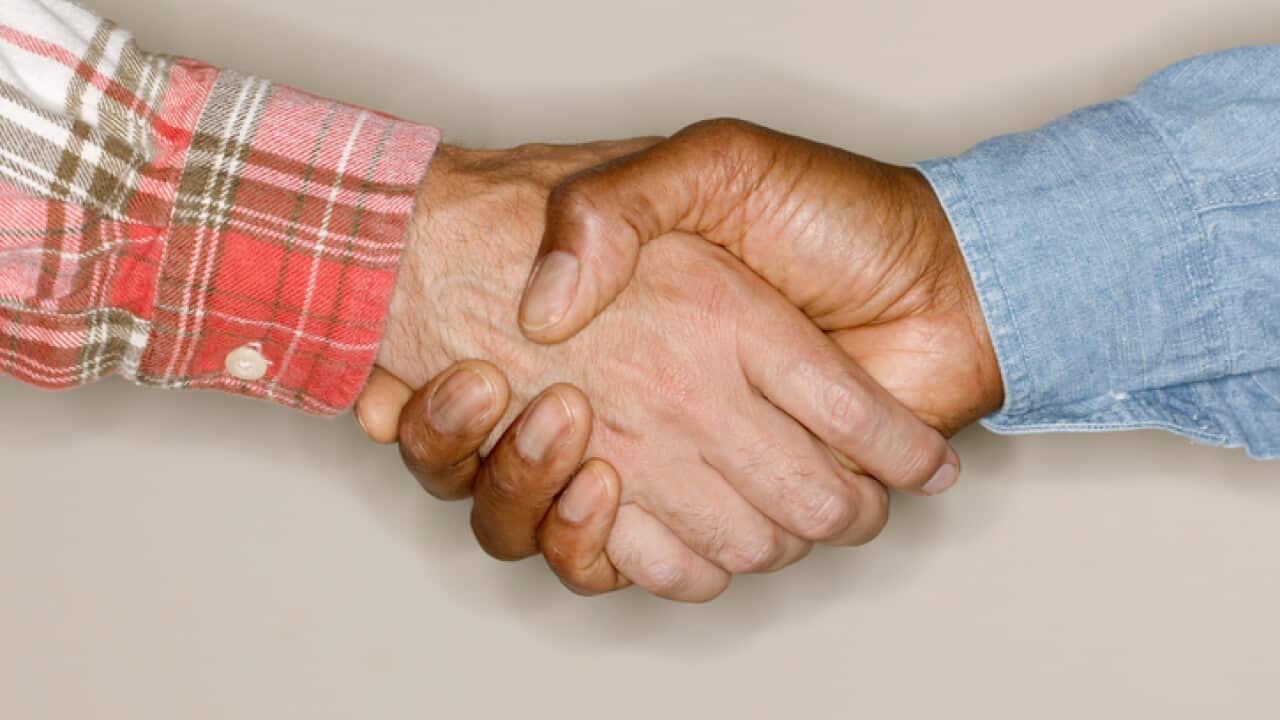 Two men shaking hands