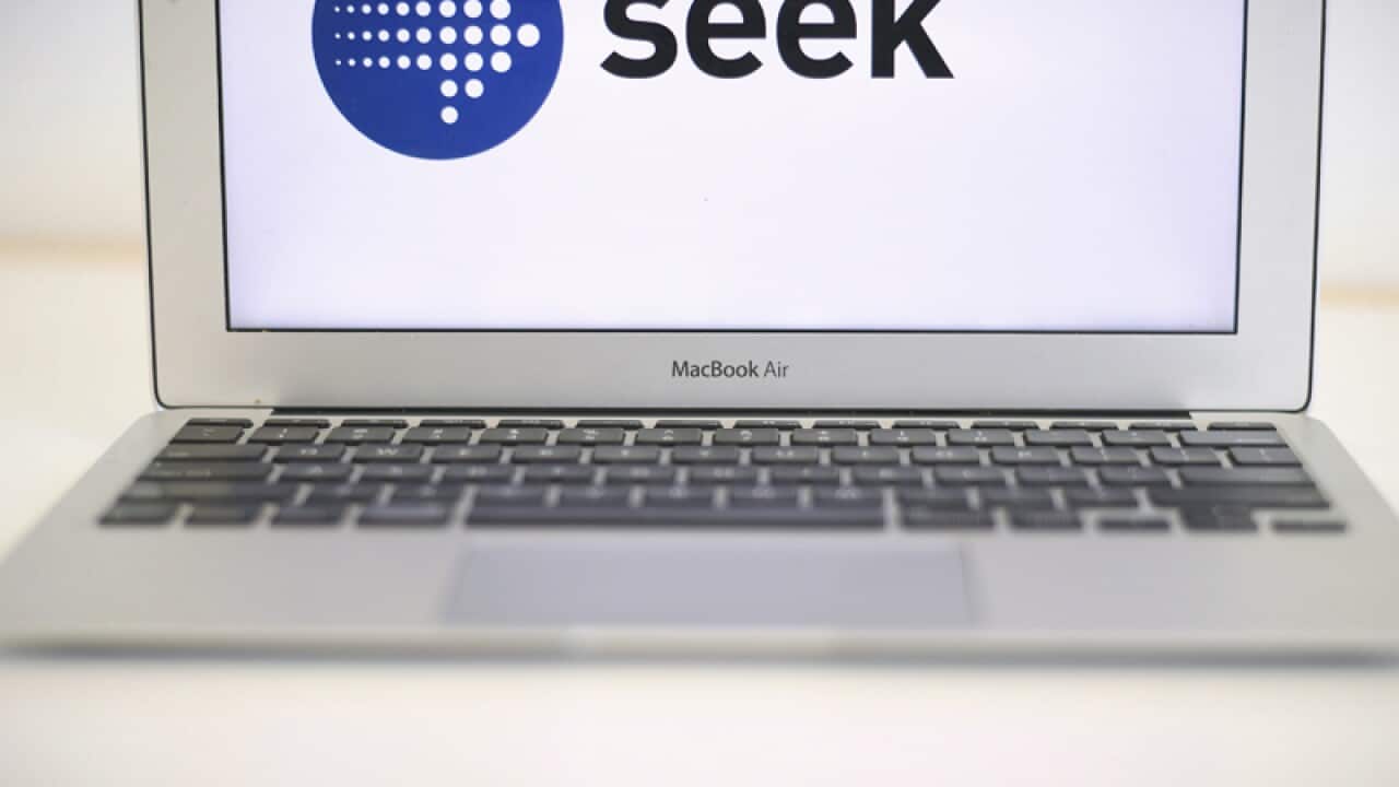 The logo for online jobs portal SEEK on a laptop