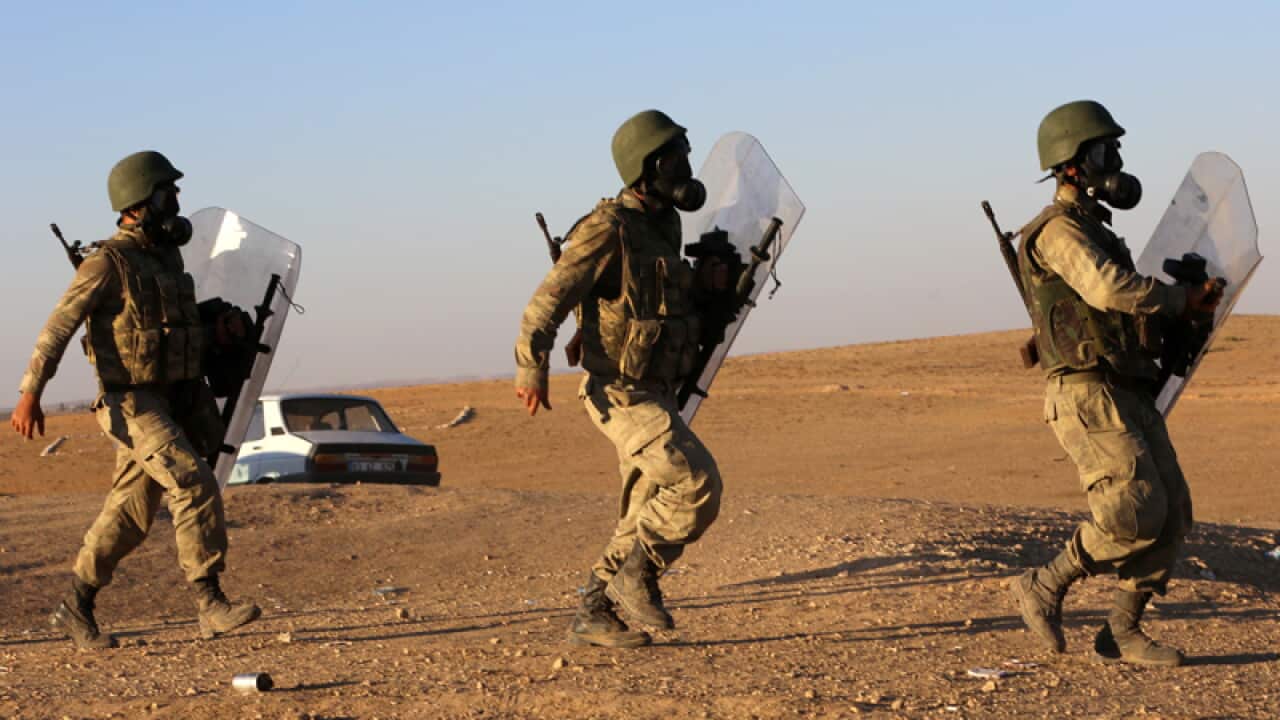 Turkish soldiers near the Turkey-Syria border