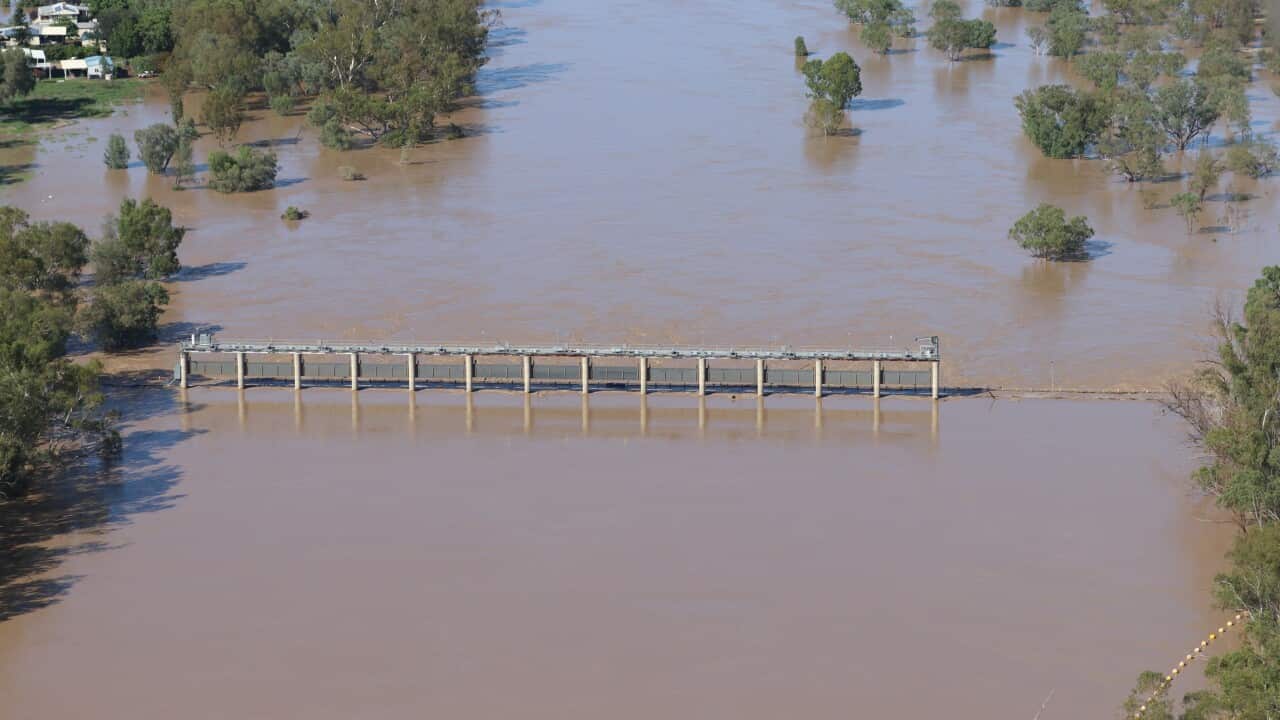 A supplied image obtained on Thursday, February 27, 2020, shows a swollen Balonne river flooding the Andrew Nixon bridge in St George.