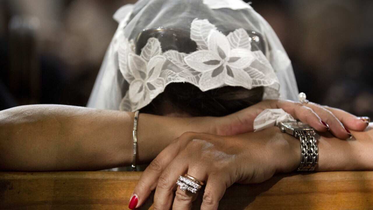 A Coptic Christian grieves