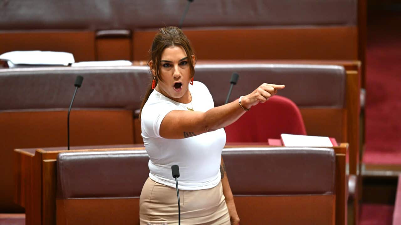 Lidia Thorpe standing and pointing