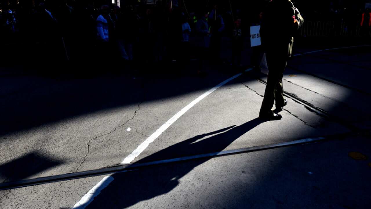 A soldier is seen during the Anzac Day march in Melbourne