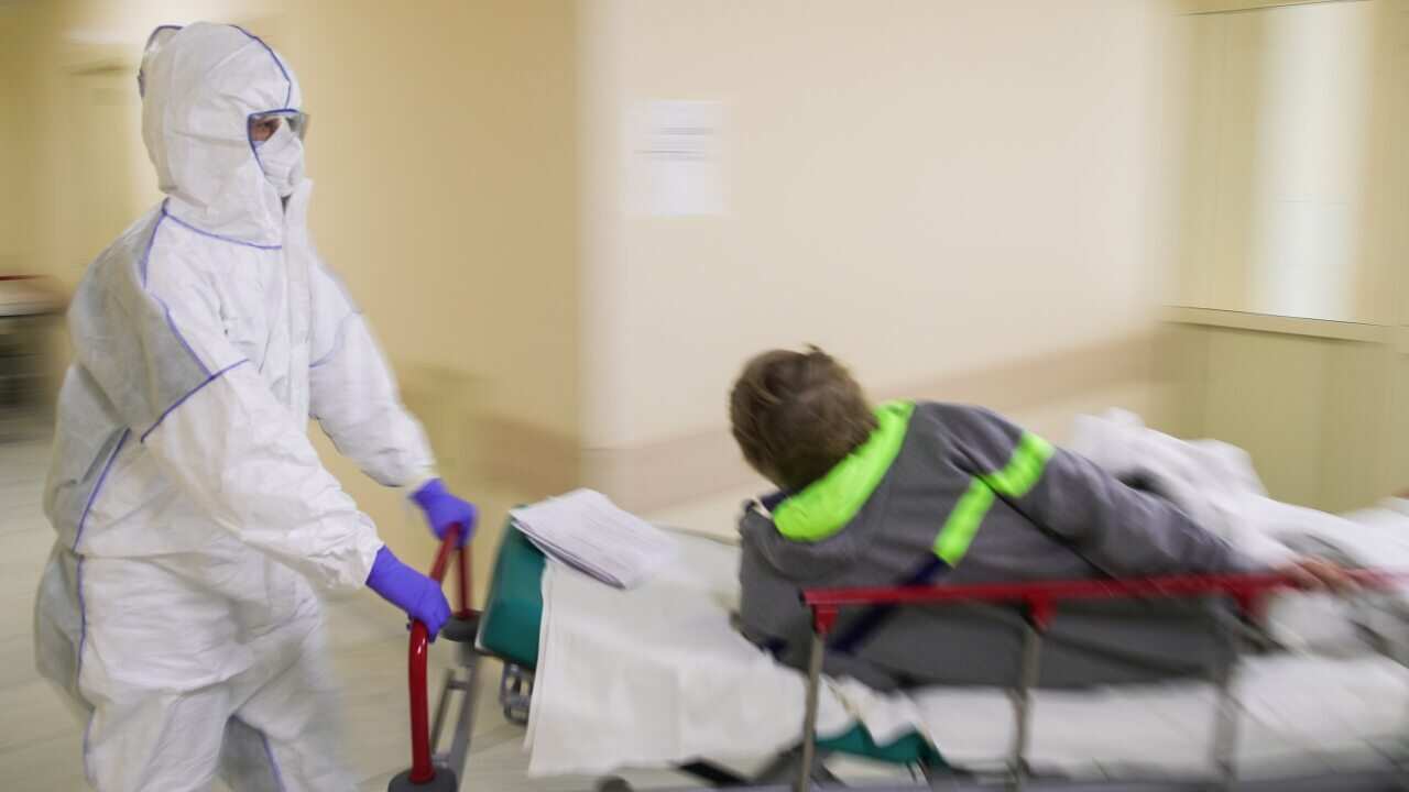An employee and a patient at the Federal Clinical Center of Higher Medical Technologies in Moscow.