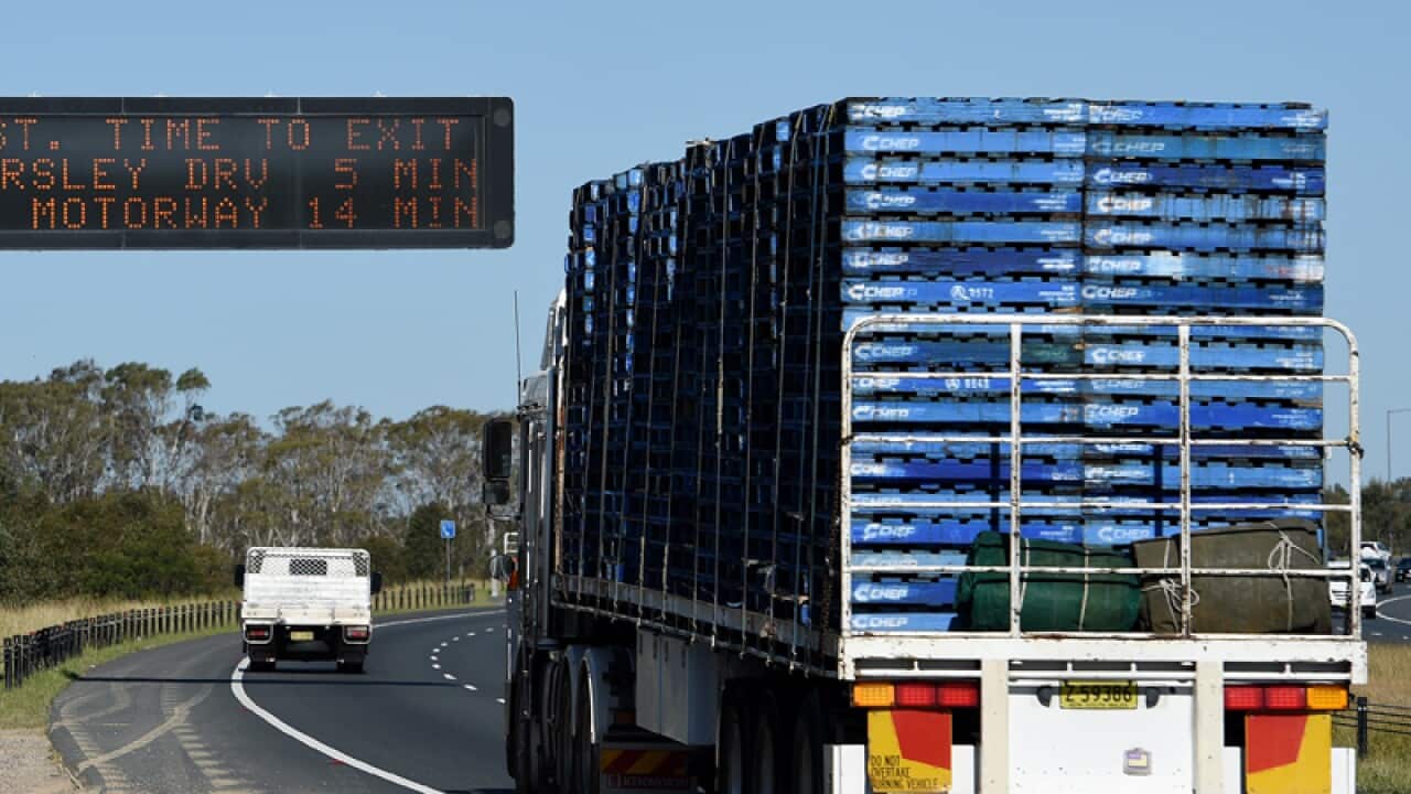 General view of heavy transport on the M7 motorway.