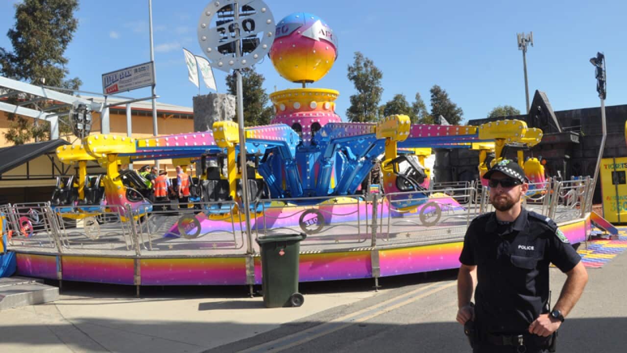 Police inspect the Airmaxx 360 ride at the Royal Adelaide Show