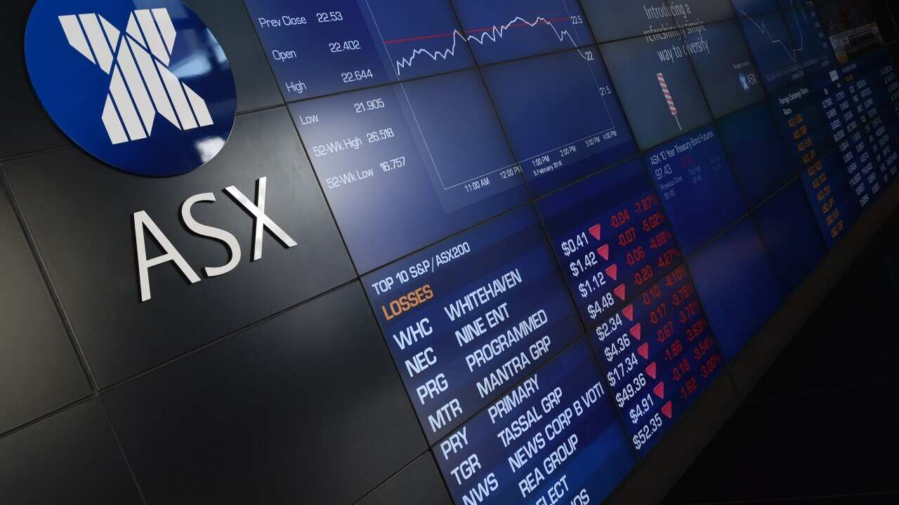 The market boards show the volatility at the Australian Securities Exchange (ASX) in Sydney, Tuesday, Feb. 9, 2016. Renewed fears about slowing global growth have wiped more than $40 billion off the value of the Australian share market