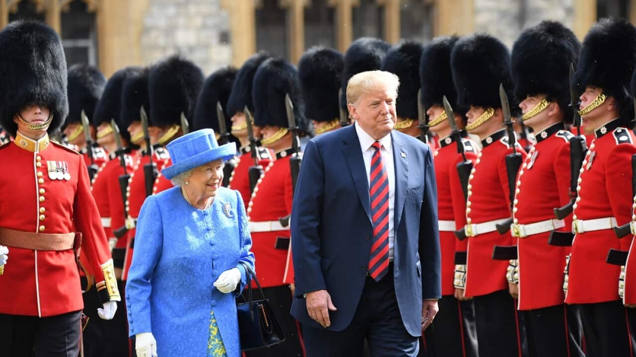 President Donald Trump and Queen Elizabeth II. The US president says he was not late to their meeting.