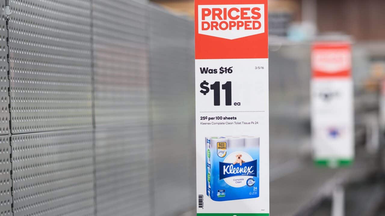 Empty shelves normally stocked with toilet paper rolls at Woolworths Supermarket in Parramatta, Sydney.