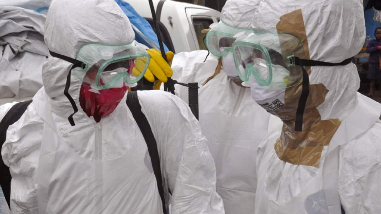 Heath workers in protective gear