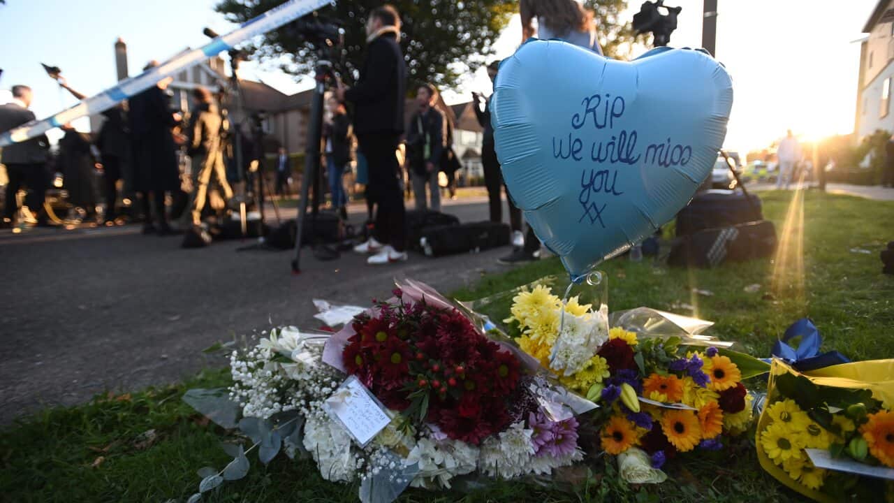 Floral tributes at the scene of a crime where MP for Southend West, Sir David Amess, was stabbed to death