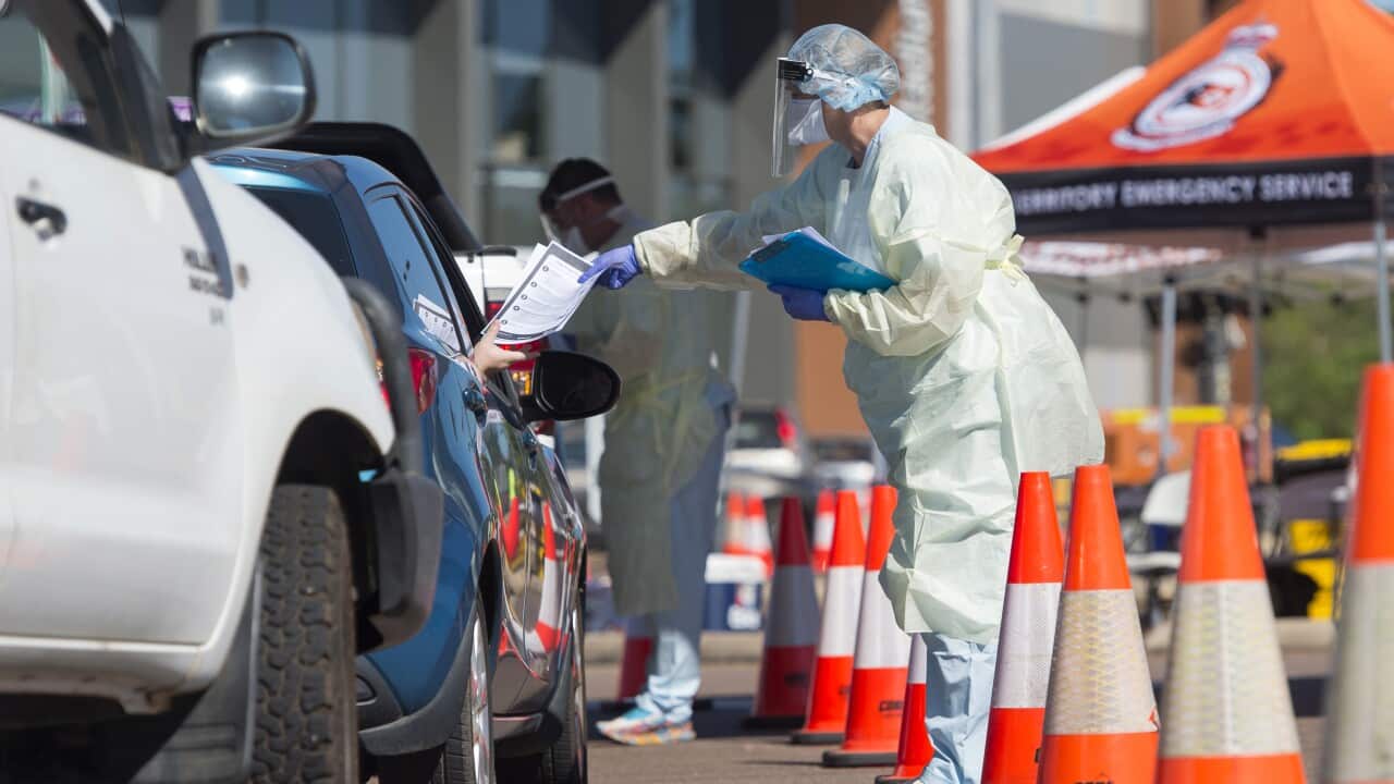 Cars queue at Darwin's Marrar drive-through COVID-19 testing facility on Thursday, 1 July, 2021.