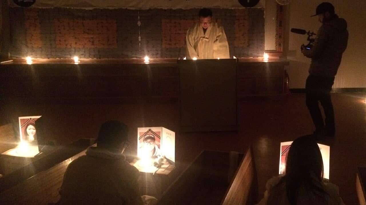 Dean films as the highly emotional fake funeral ceremony gets underway.