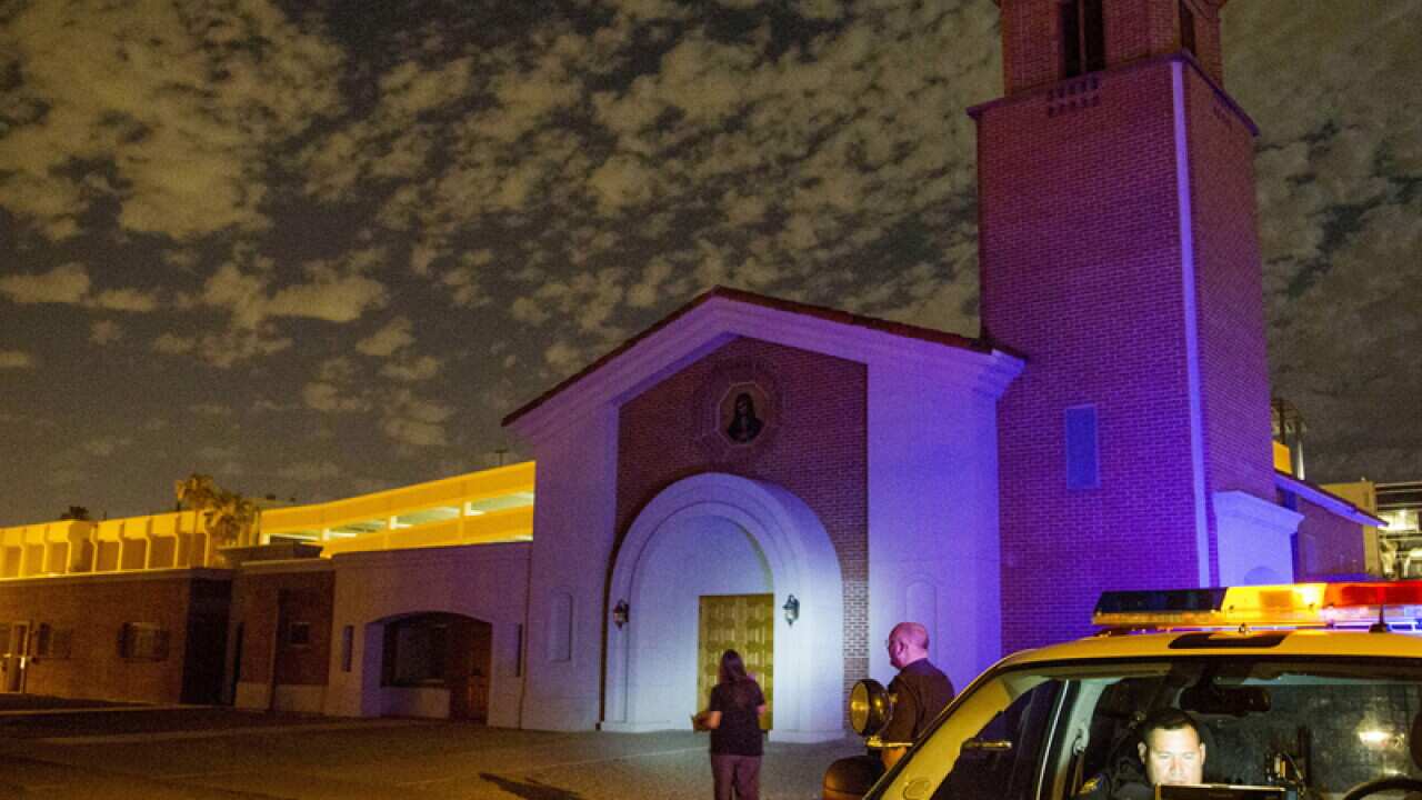 Police investigate a shooting at a church in Arizona