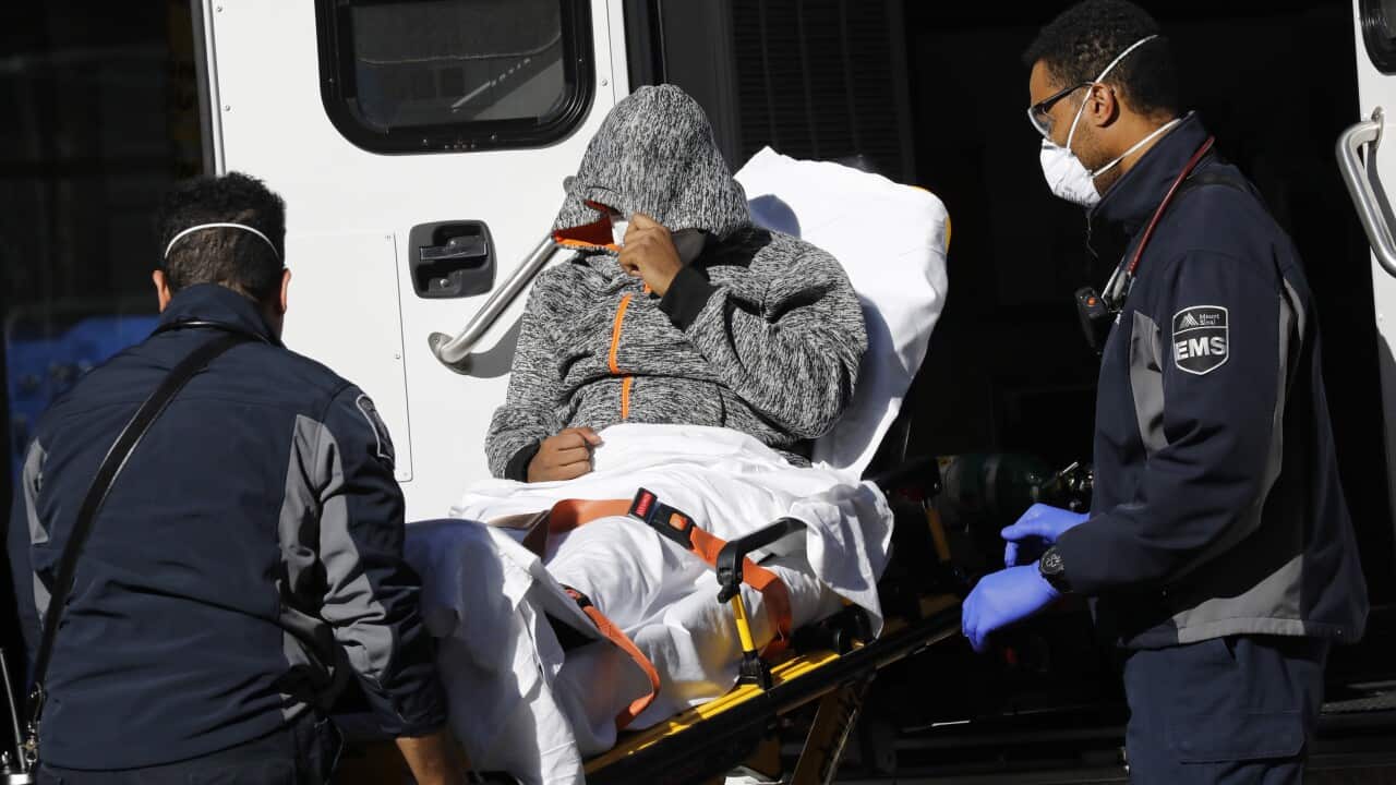 A patient arrives at Mount Sinai West Hospital in New York, New York, USA, 26 March 2020.