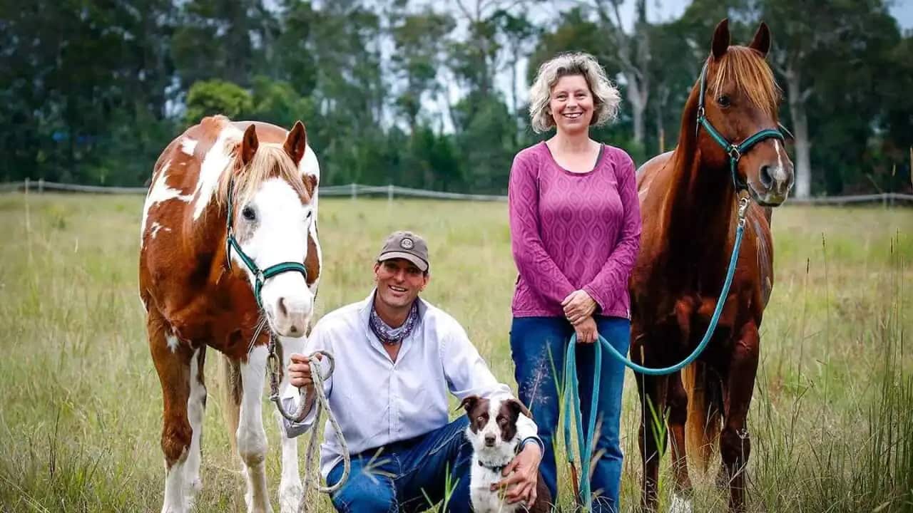 Erwin and Monique van Vliet with their horses.