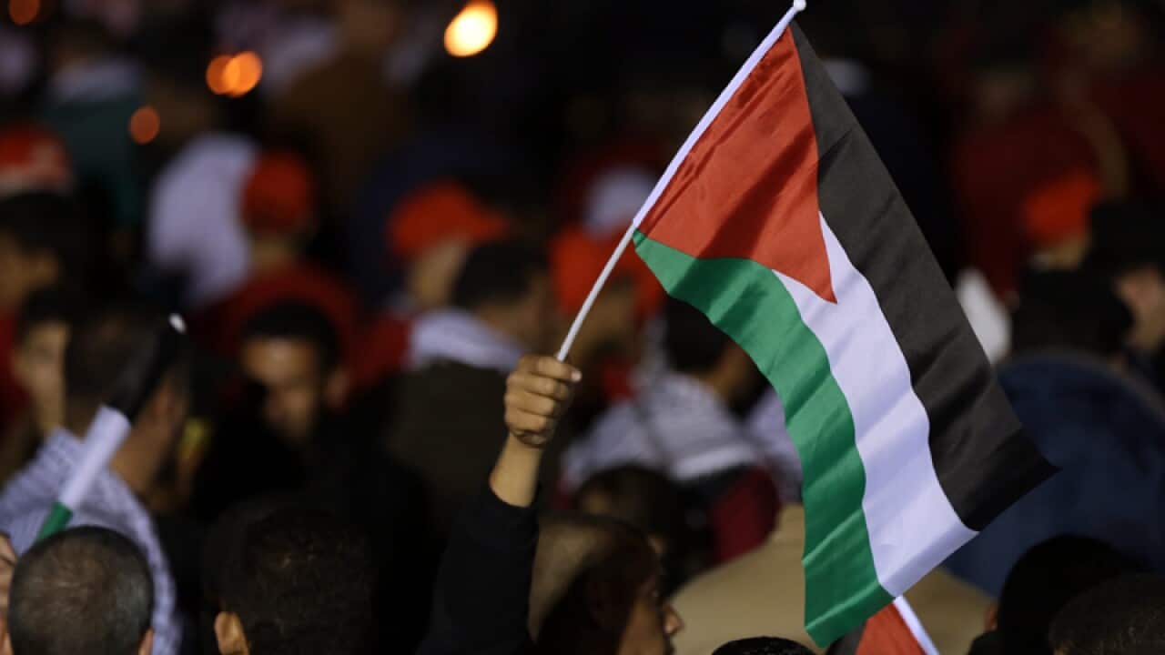 Palestinians celebrate the 50th anniversary of the PLO