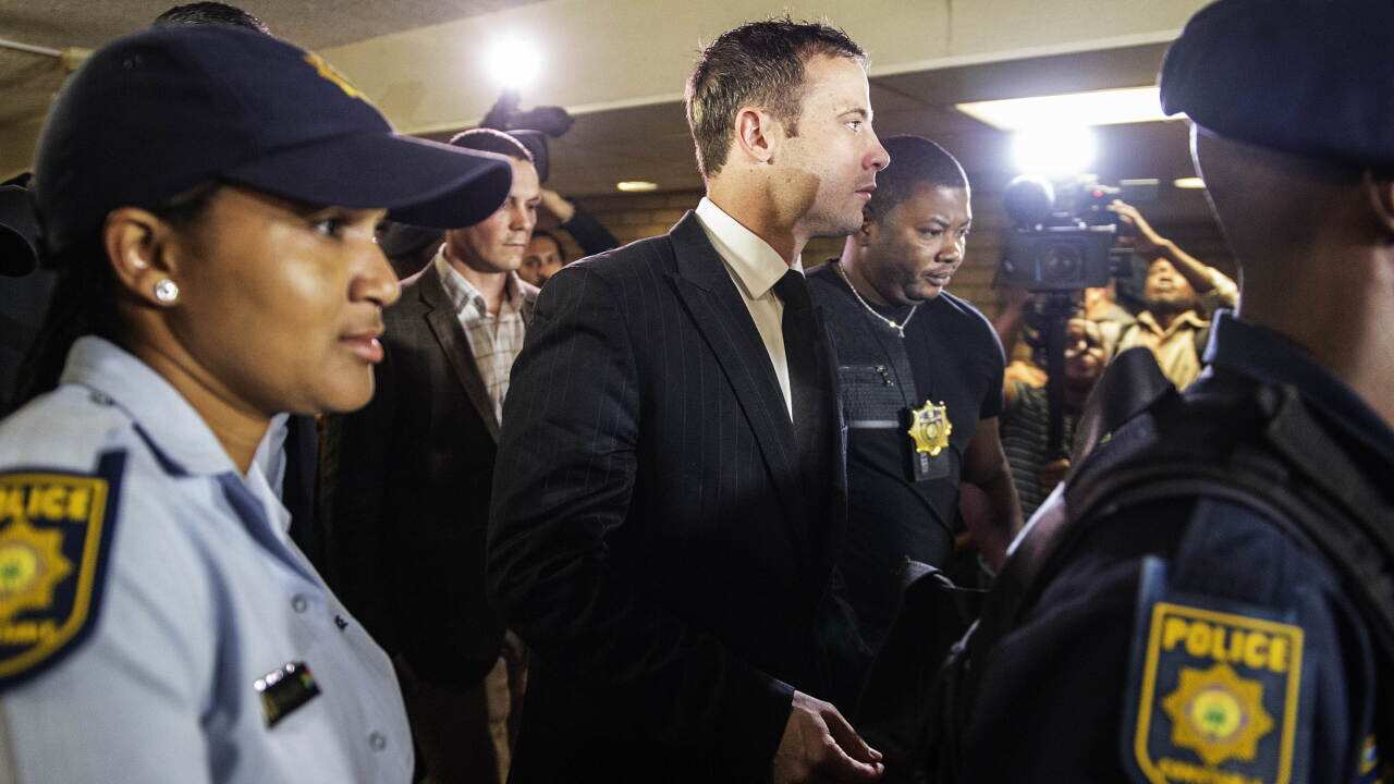 Oscar Pistorius arrives in court for day two of verdict