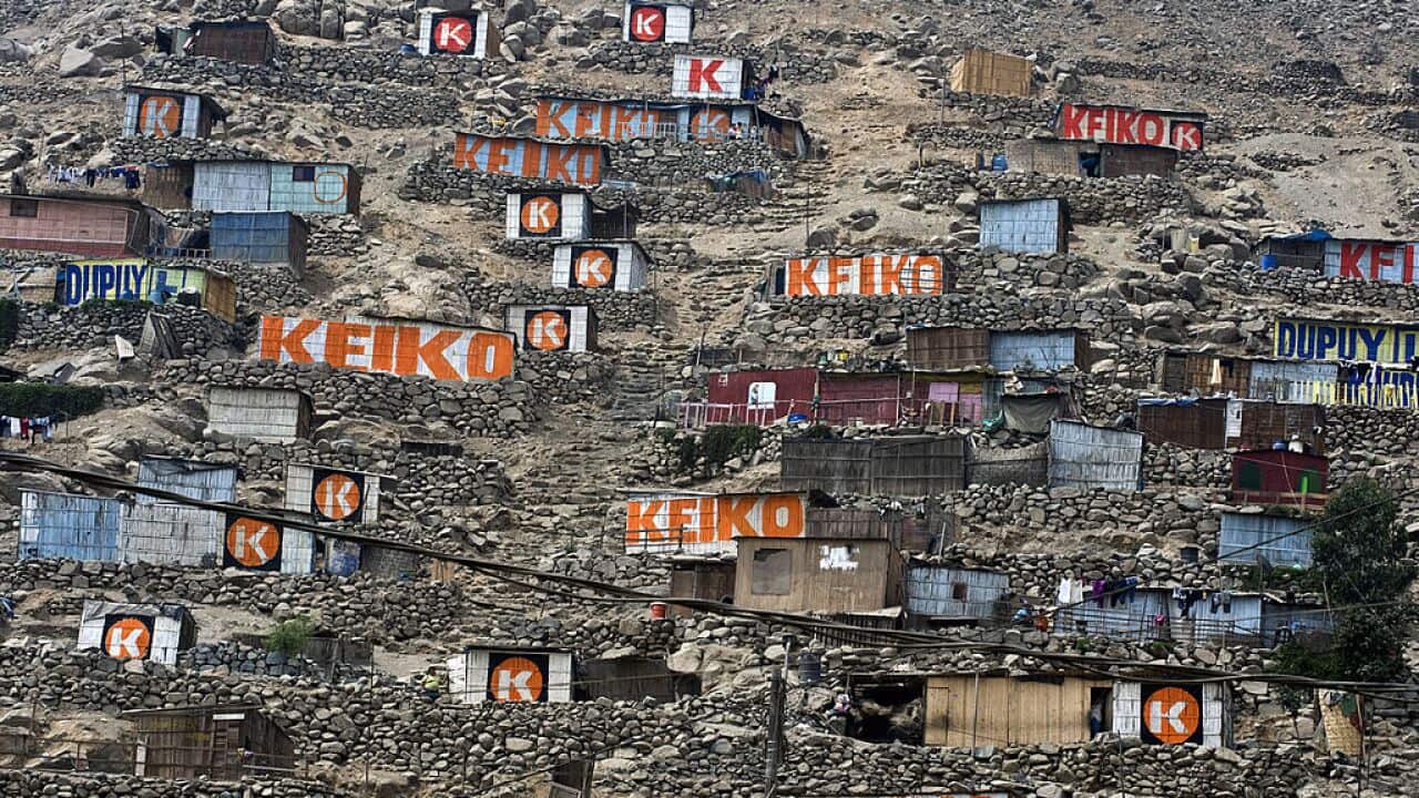 View of houses painted with the first na