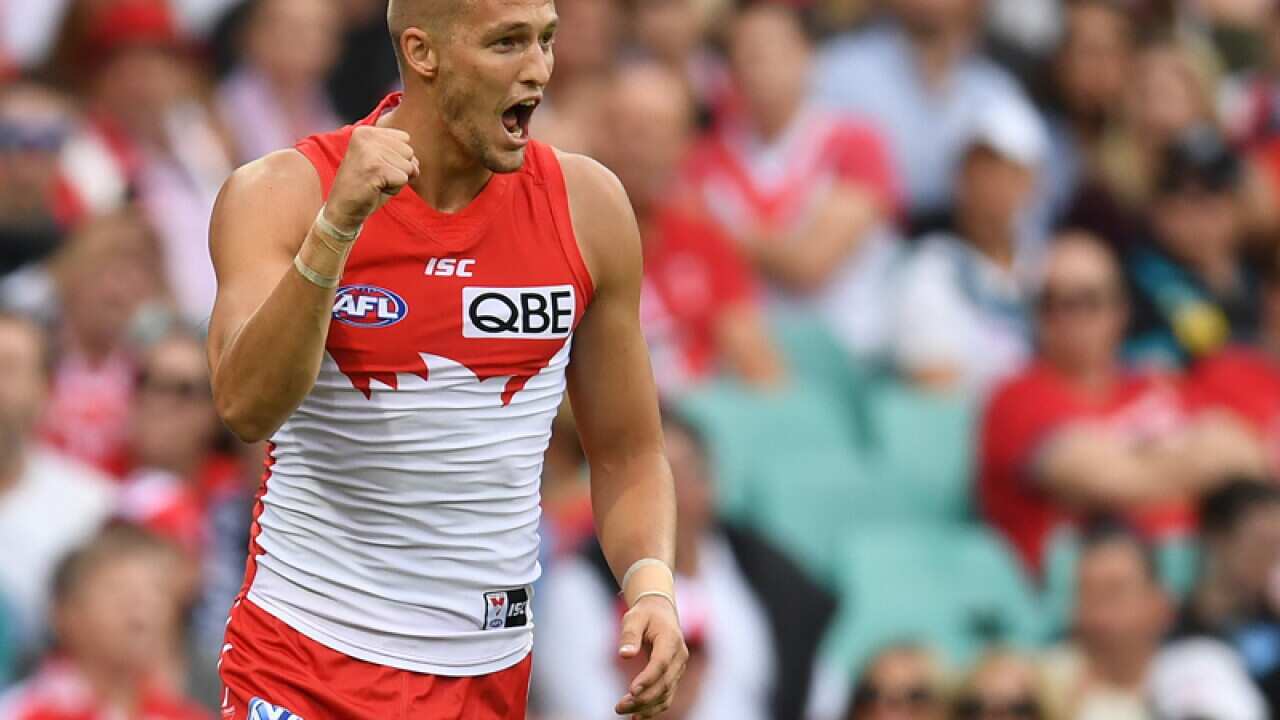 Sam Reid of the Swans celebrates