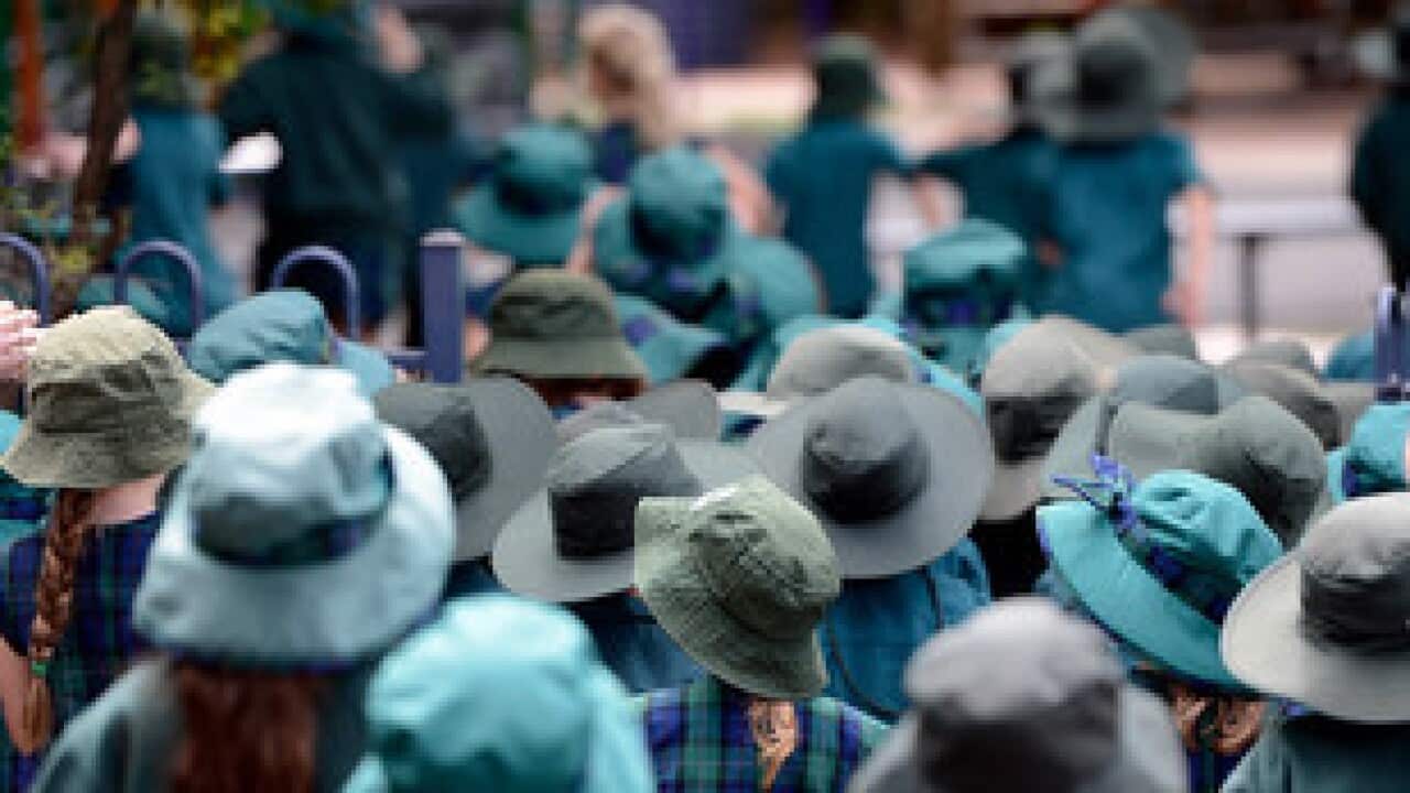 **FILE** A Monday, April 15, 2013 file photo of primary school students in Brisbane. (AAP Image/Dan Peled) NO ARCHIVING
