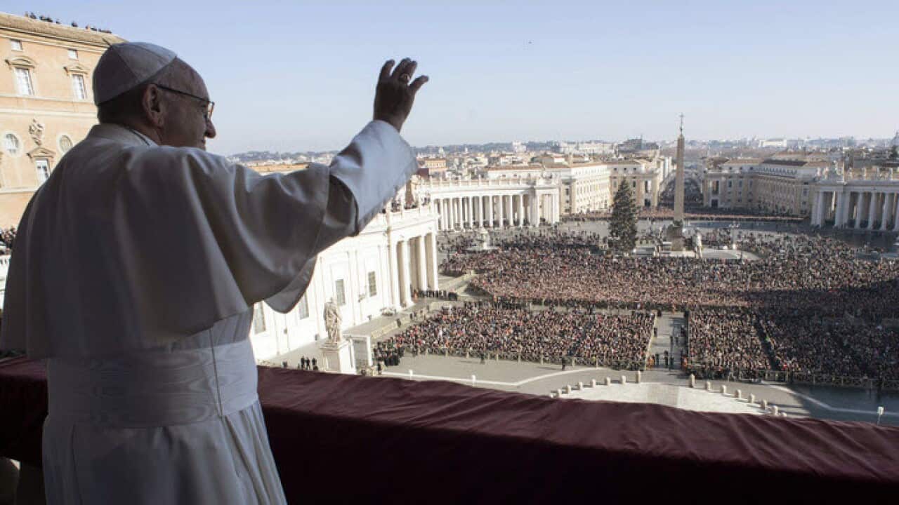 Pope Francis addressing a Christmas crowd at the Vatican