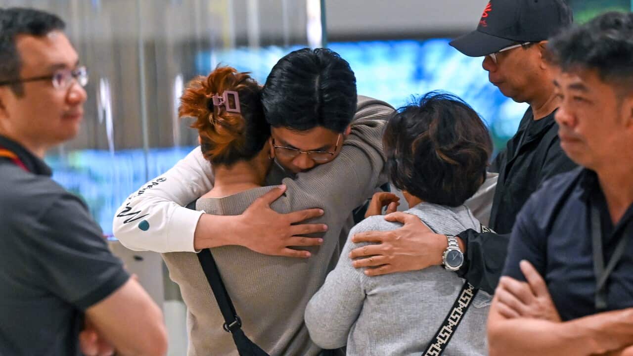 Passengers being greeted in an airport
