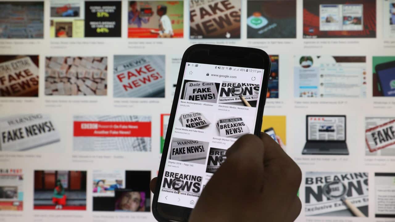 Mobile phone loading information on how to counter 'fake news', May 2019.