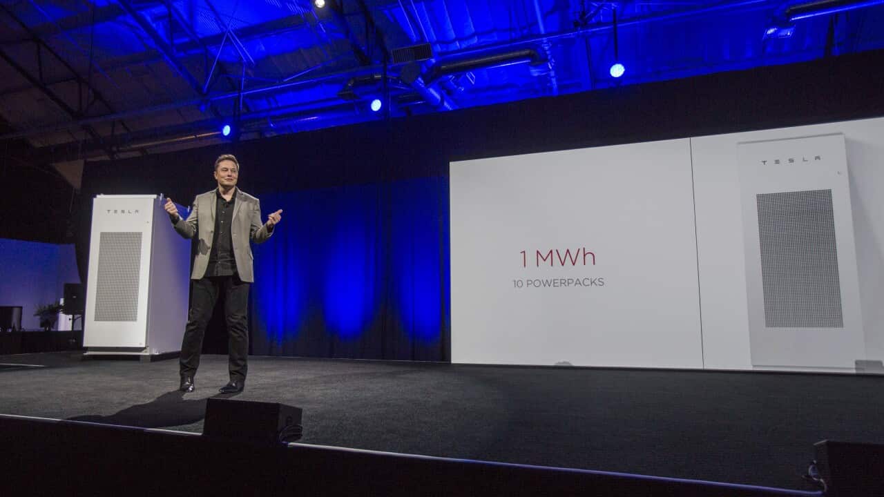 Elon Musk, CEO of Tesla Motors Inc., unveils the companys newest product, Powerpack in Hawthorne, Calif., Thursday, April 30, 2015. (AP Photo/Ringo H.W. Chiu)