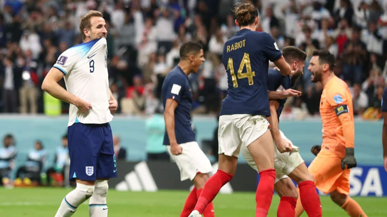 France players celebrate as Harry Kane misses an England penalty