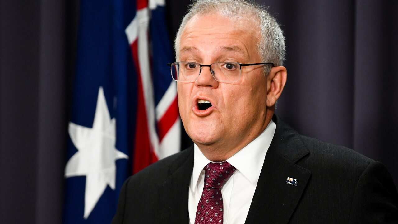 Australian Prime Minister Scott Morrison speaks during a press conference at Parliament House in Canberra on Tuesday.