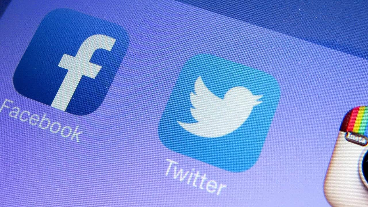 General view of social media apps Facebook, Twitter and Instagram displayed on an iPhone 5.